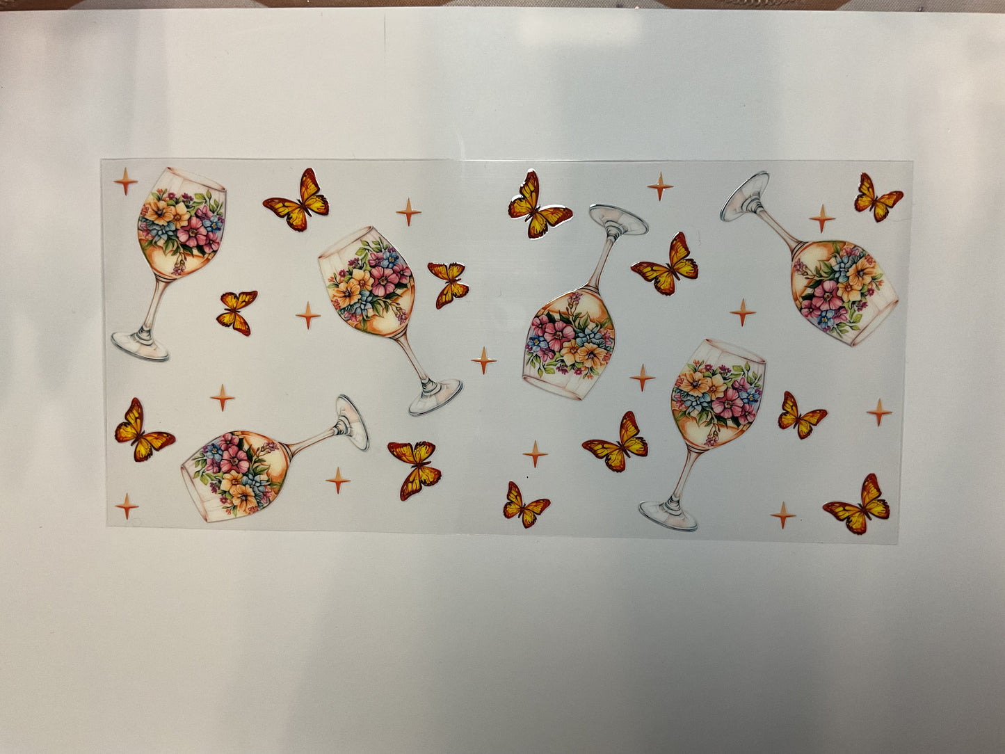 Flowered Wine Glasses and Butterflies